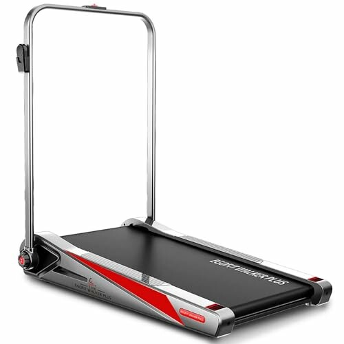 Compact foldable treadmill with handrails.