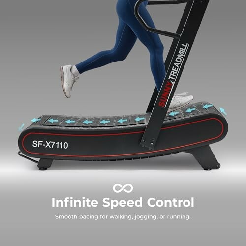 A person running on a curved treadmill with infinite speed control.