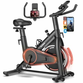 Stationary exercise bike with smart display and phone holder.