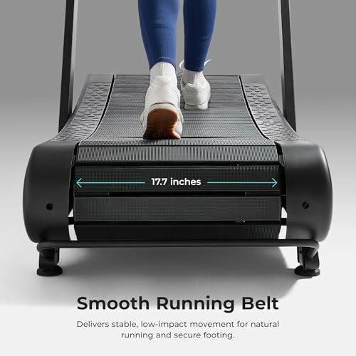 A person running on a treadmill with a smooth running belt, 17.7 inches wide.