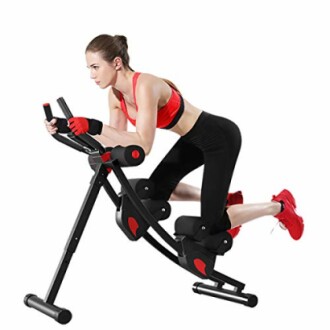 Woman using an abdominal exercise machine.