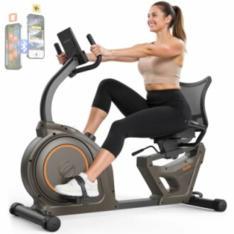 Woman exercising on a recumbent bike with a smartphone holder.